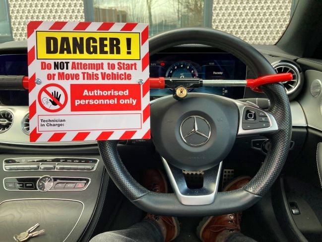 Steering Wheel Lockout & Sign